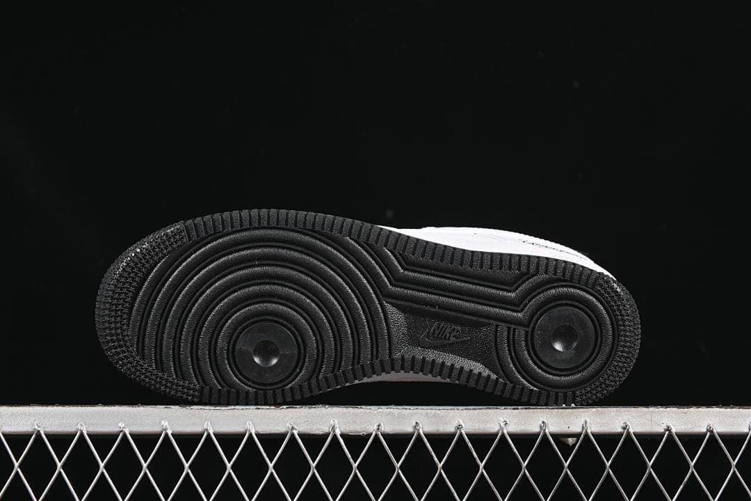 Underside view showing the black circular-pattern outsole