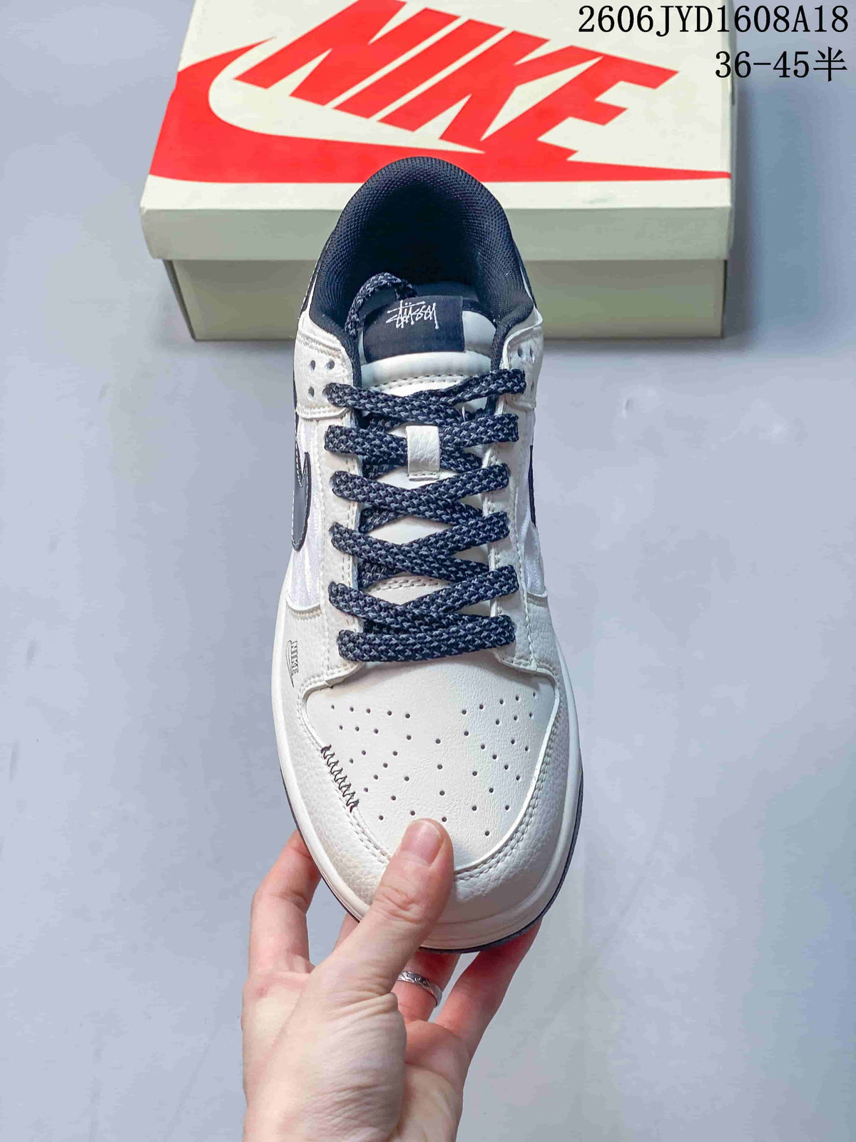 Top view showing the perforated toe and patterned navy laces