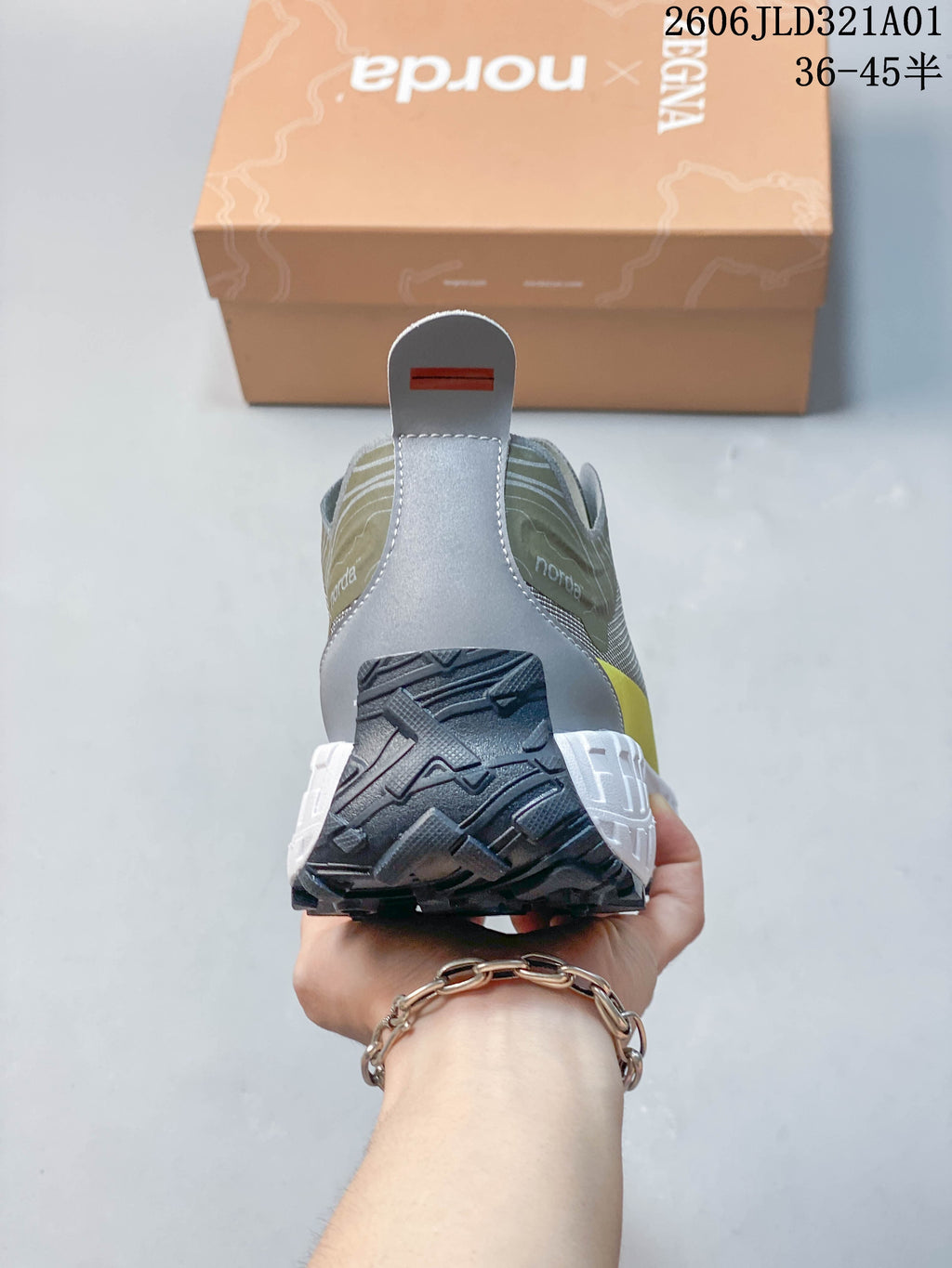 Rear view of the shoe showing the heel pull tab and outsole tread.