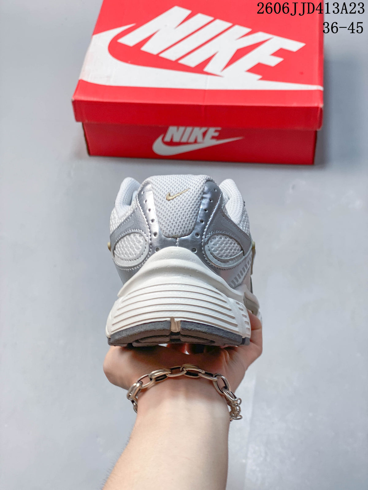 Rear view showing the heel panels and sculpted midsole