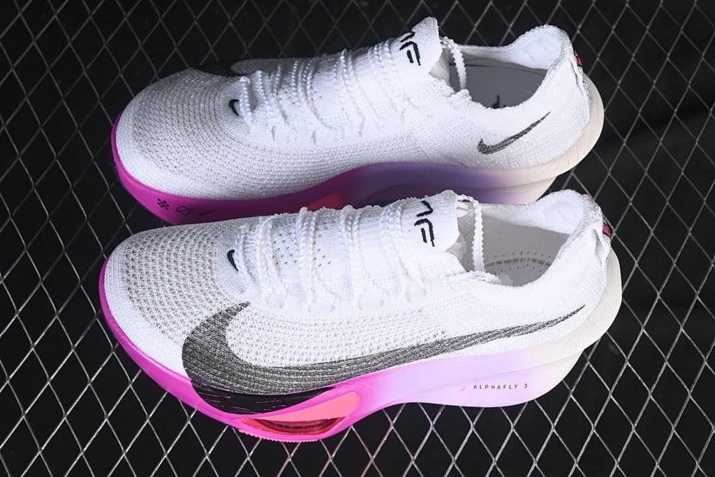 Pair of white Nike Alphafly 3 shoes shown from the side.