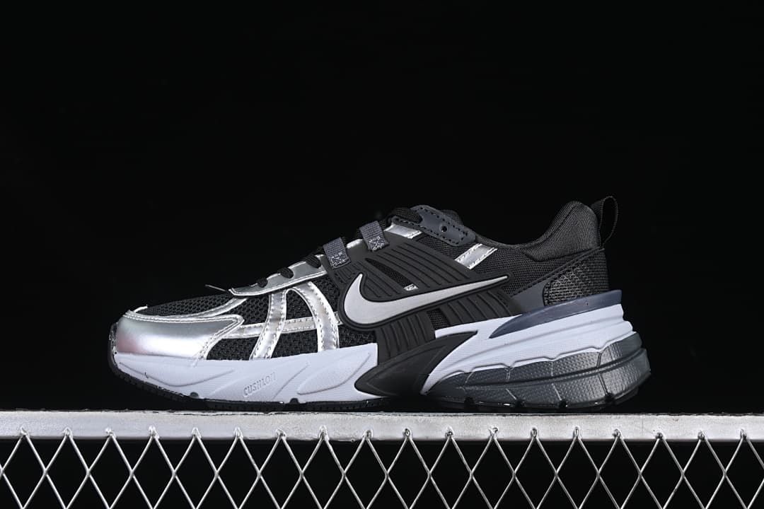 Side view of black, silver, and white Nike V2K Run shoes