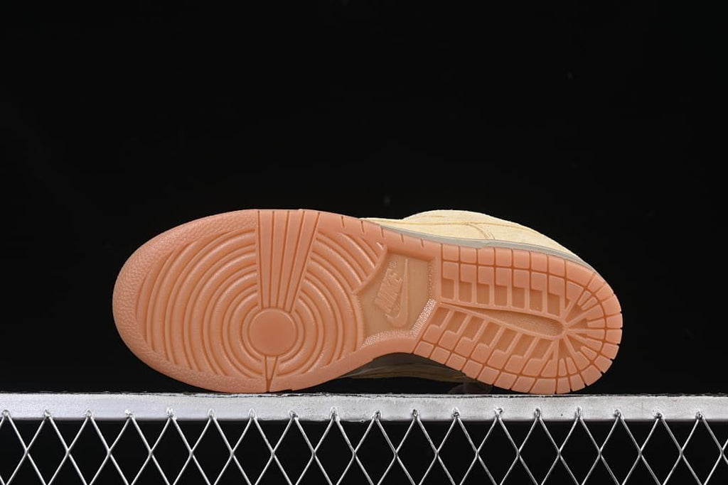 Gum-colored outsole with circular forefoot tread pattern