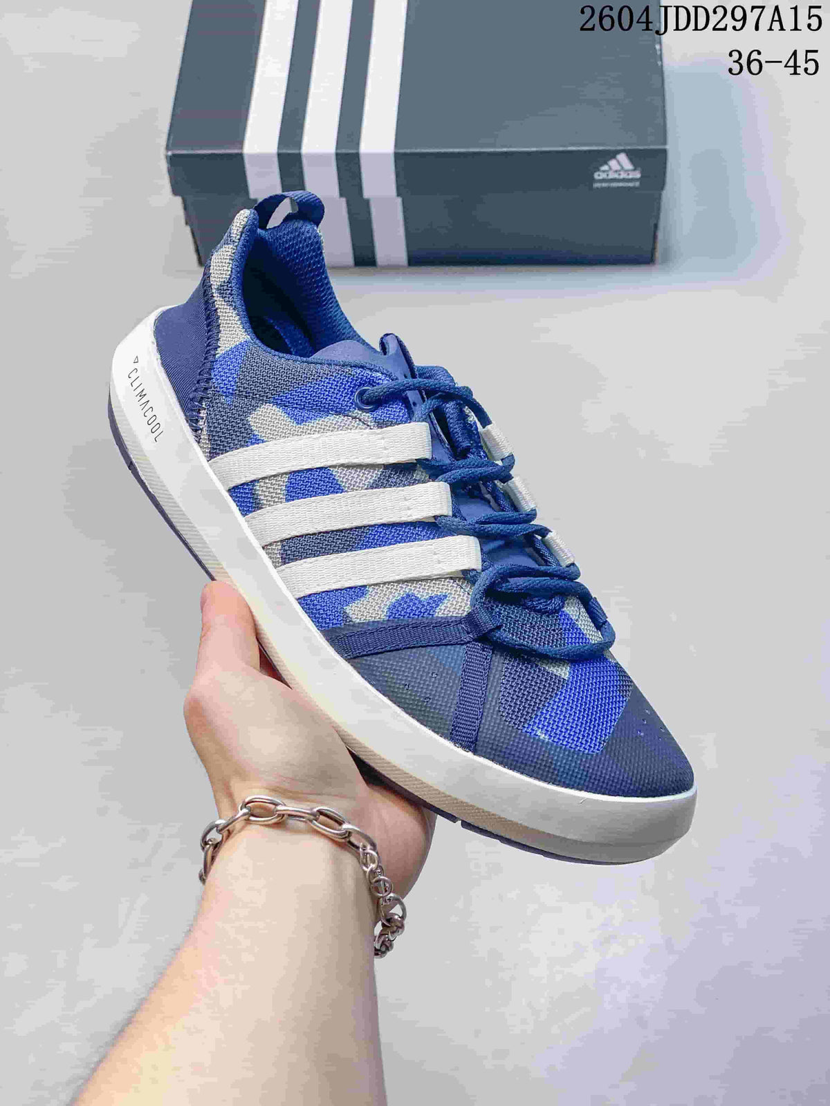 Angled view of a blue and gray adidas Terrex CC Boat shoe