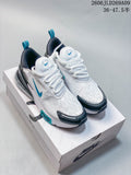 Pair of white Nike Air Max 270 sneakers with teal and dark accents displayed on a shoe box