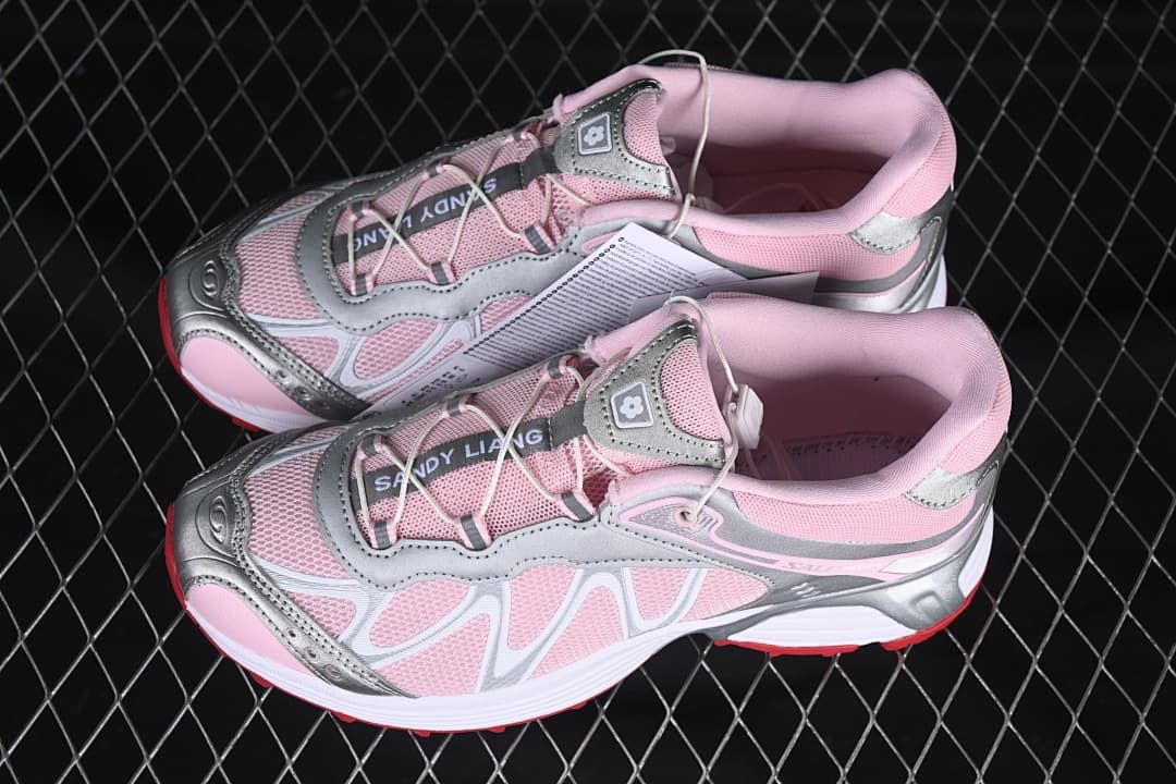 Pair of pink and silver-tone sneakers shown from above