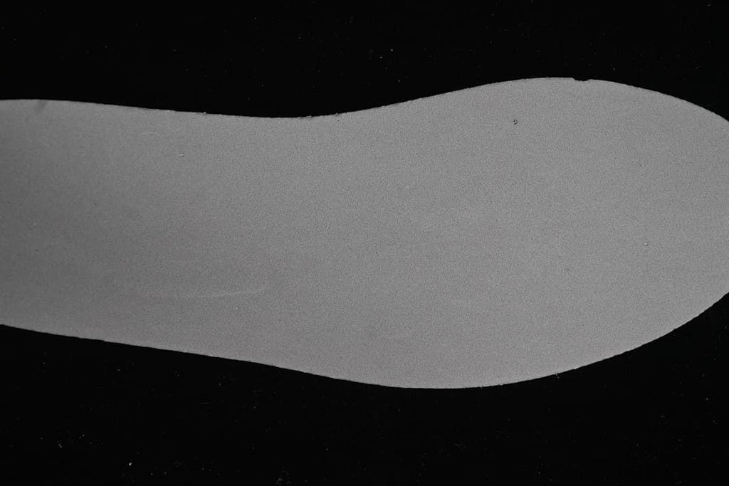 Close-up view of a gray shoe insert.