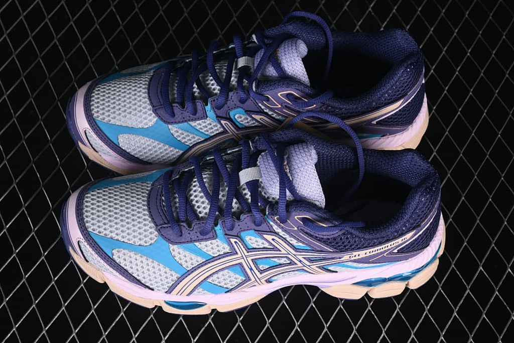 Pair of multicolor ASICS GEL-CUMULUS 16 sneakers viewed from above.