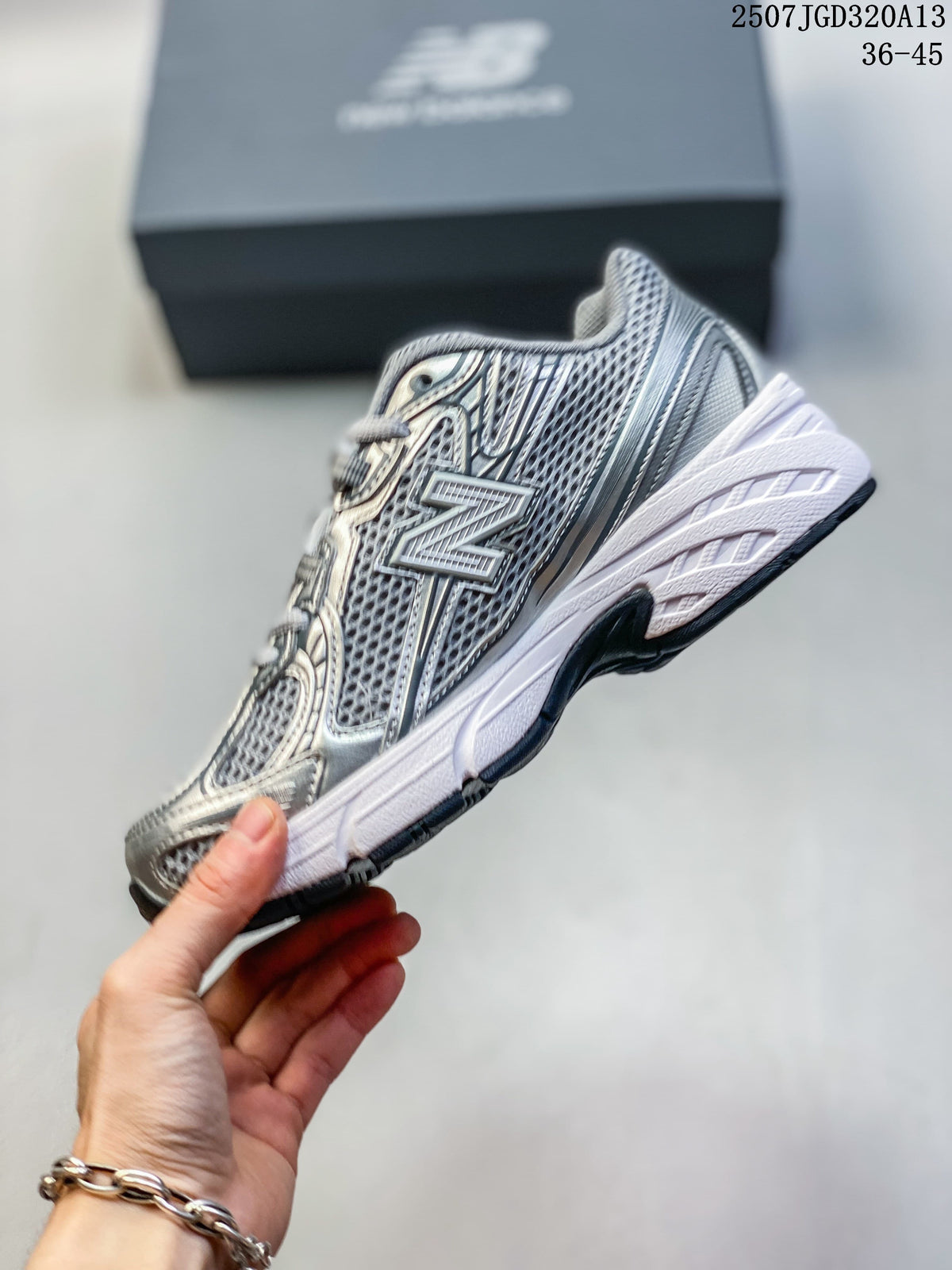 Side profile showing the layered upper and sculpted midsole of a New Balance 740