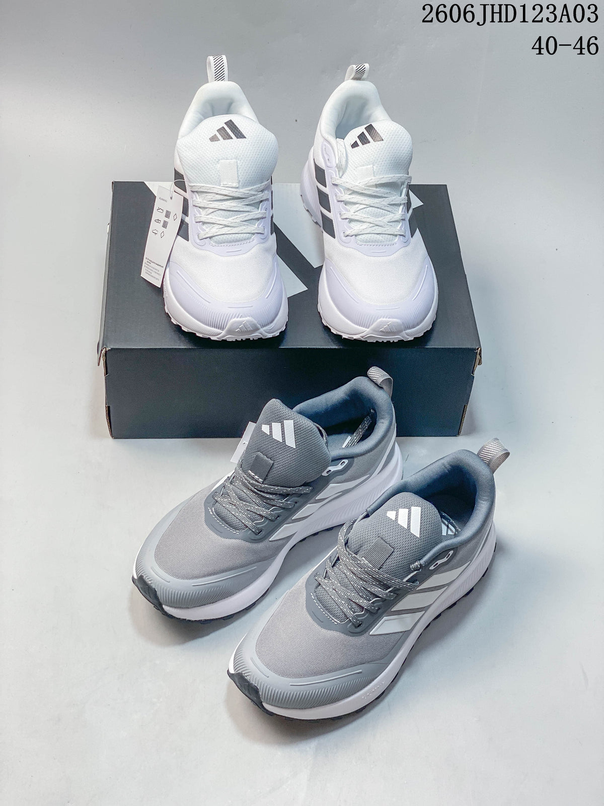 White and gray Adidas Runfalcon 5 TR shoes displayed together.