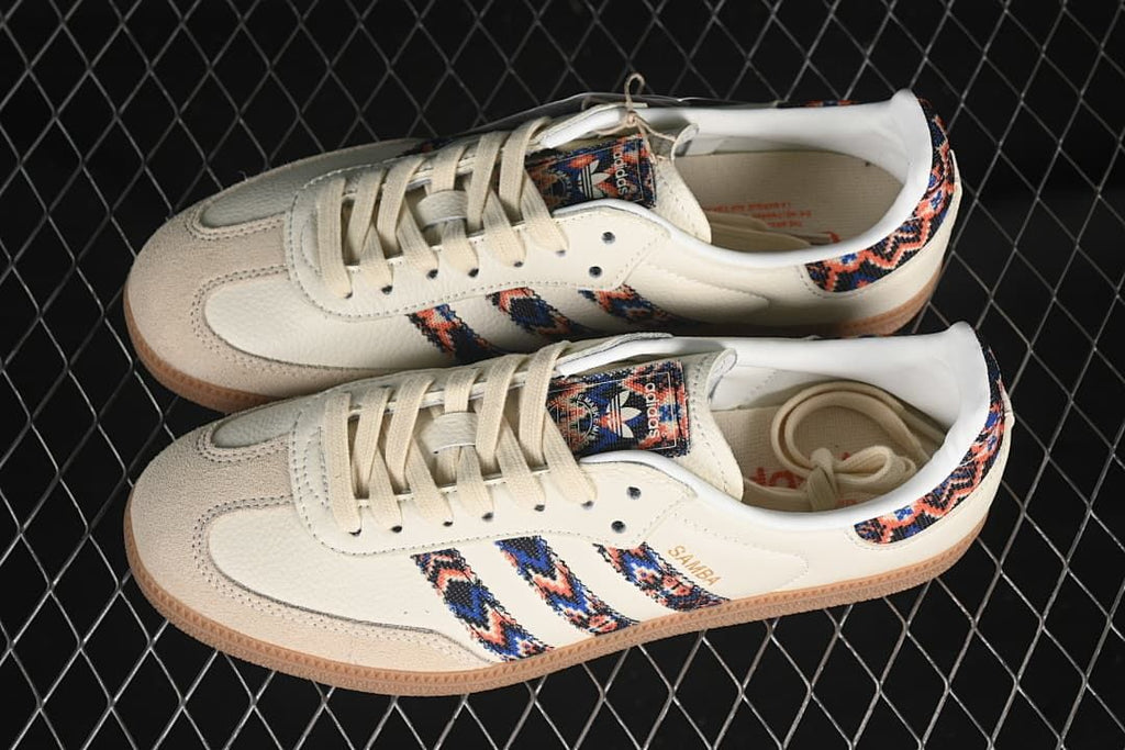 Pair of cream Samba OG sneakers with patterned stripes and heel panels