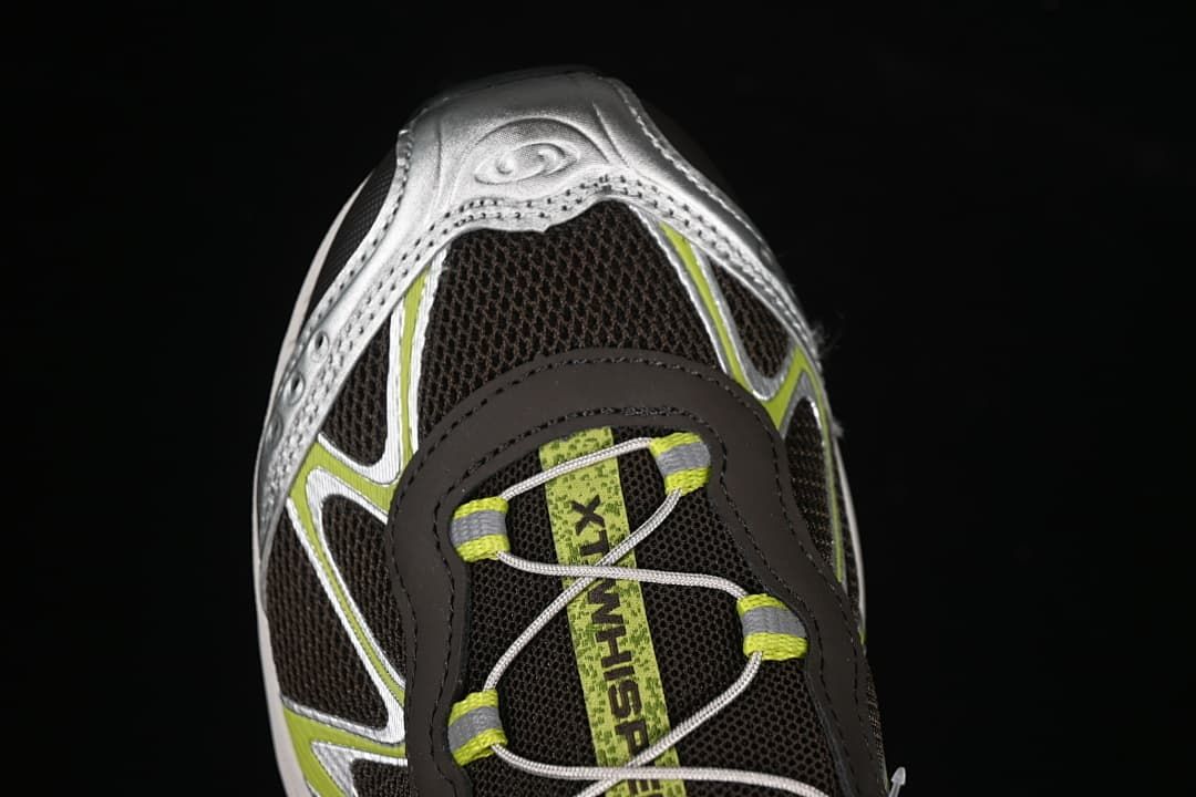 Top view of the sneaker’s lacing and silver toe detailing