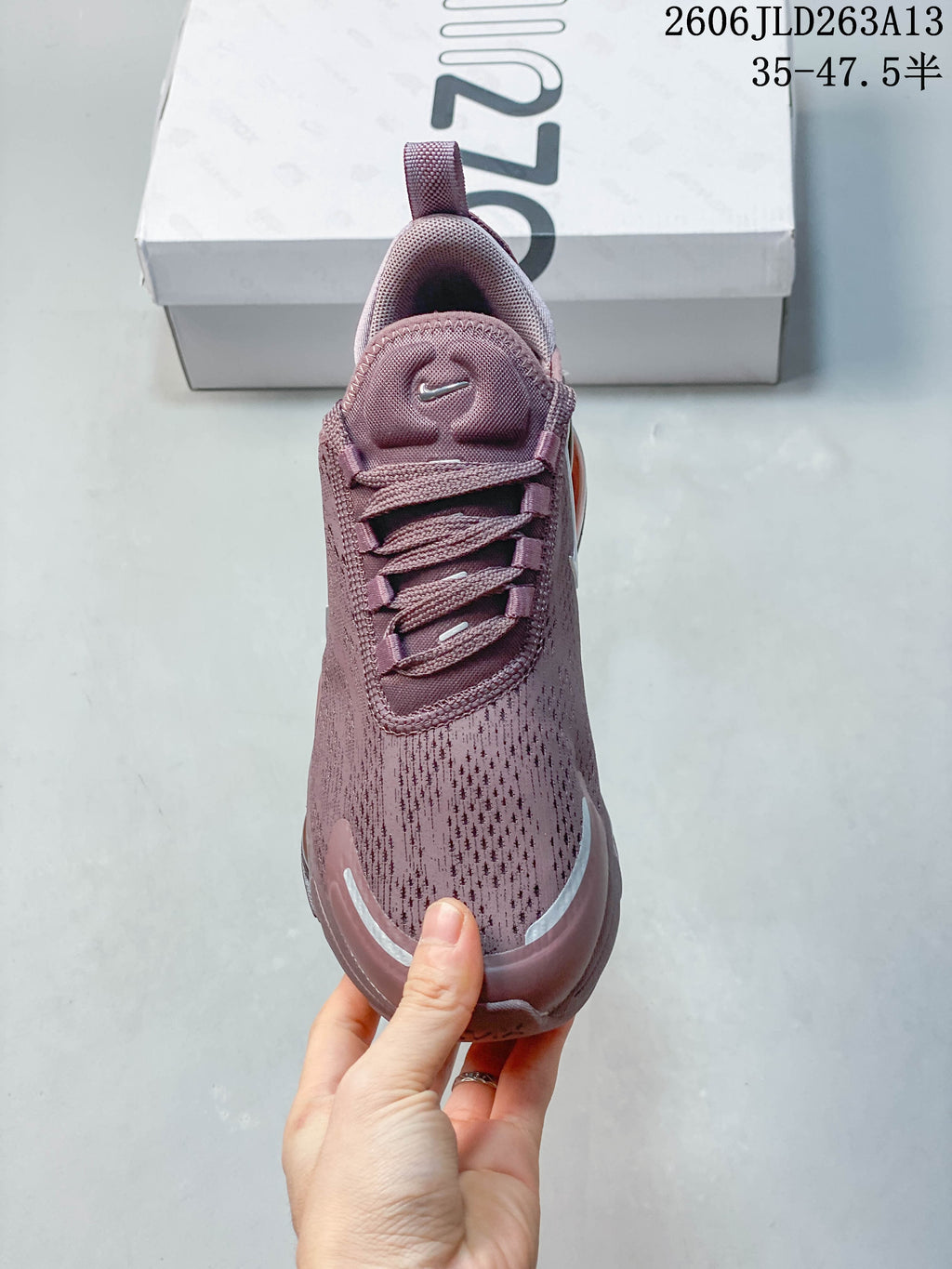 Top view of the sneaker showing its laces and patterned upper