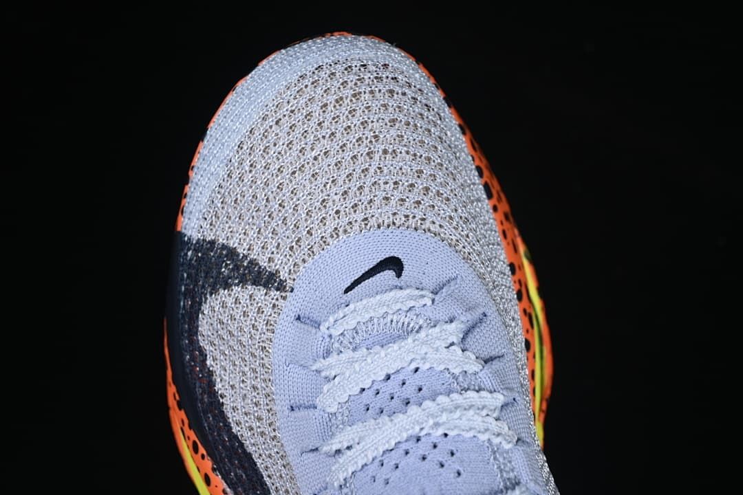 Top view of the knit-textured toe and lace area.