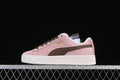 Side view of pink Puma Suede XL sneakers with dark brown accents and a white sole.