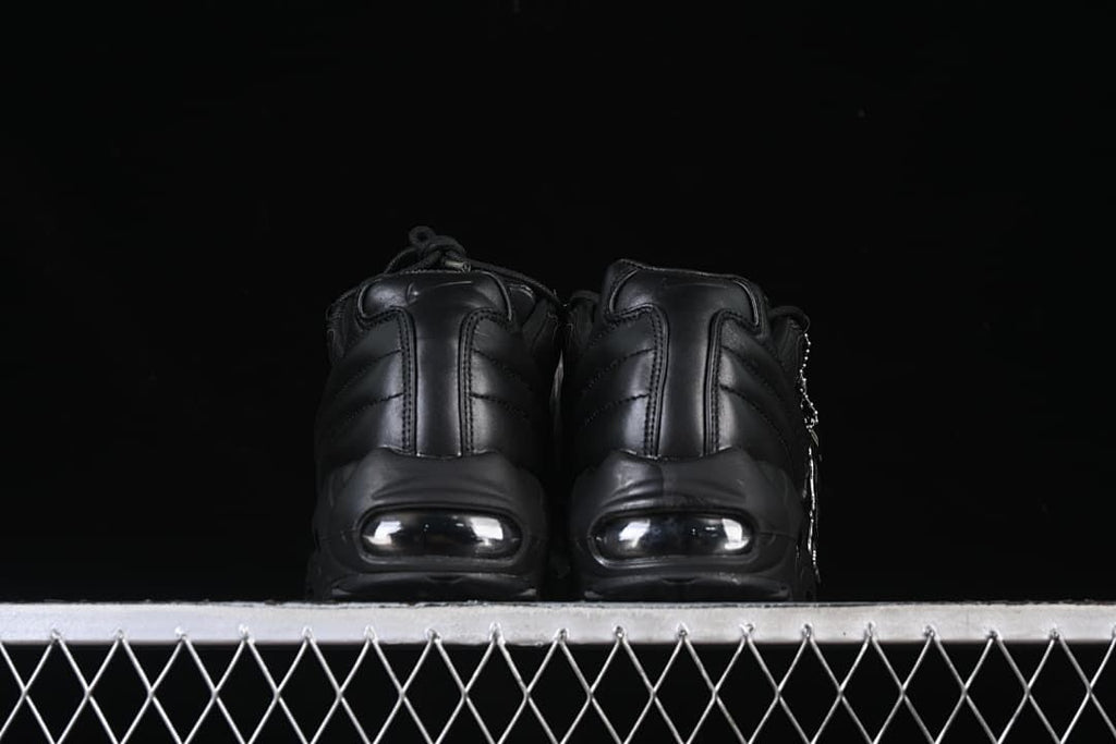 Rear view of both sneakers with visible heel Air units