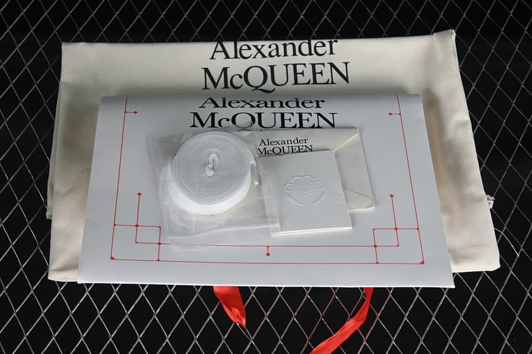 Shoebox and displayed accessories photographed with the sneakers