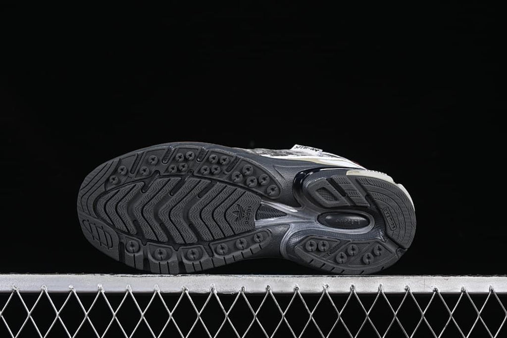 Outsole view showing the patterned tread and molded sole details.