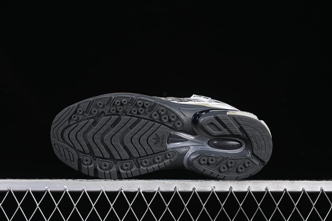 Outsole view showing the patterned tread and molded sole details.