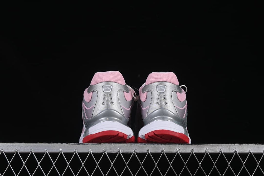 Rear view of the pair showing heel details and red outsole edges