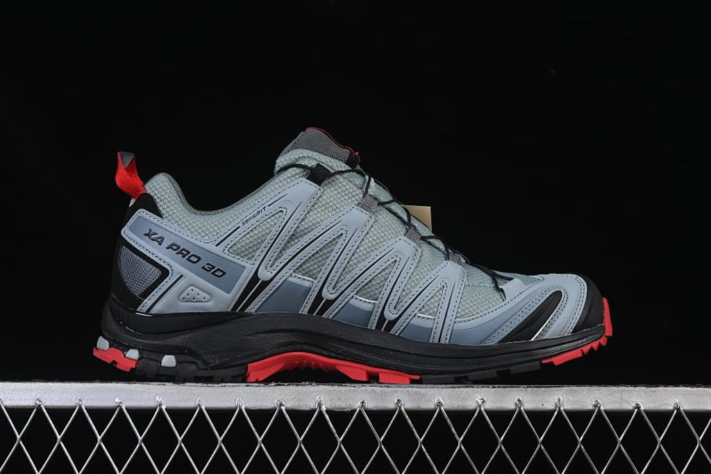 Side profile showing XA PRO 3D branding and red outsole accents