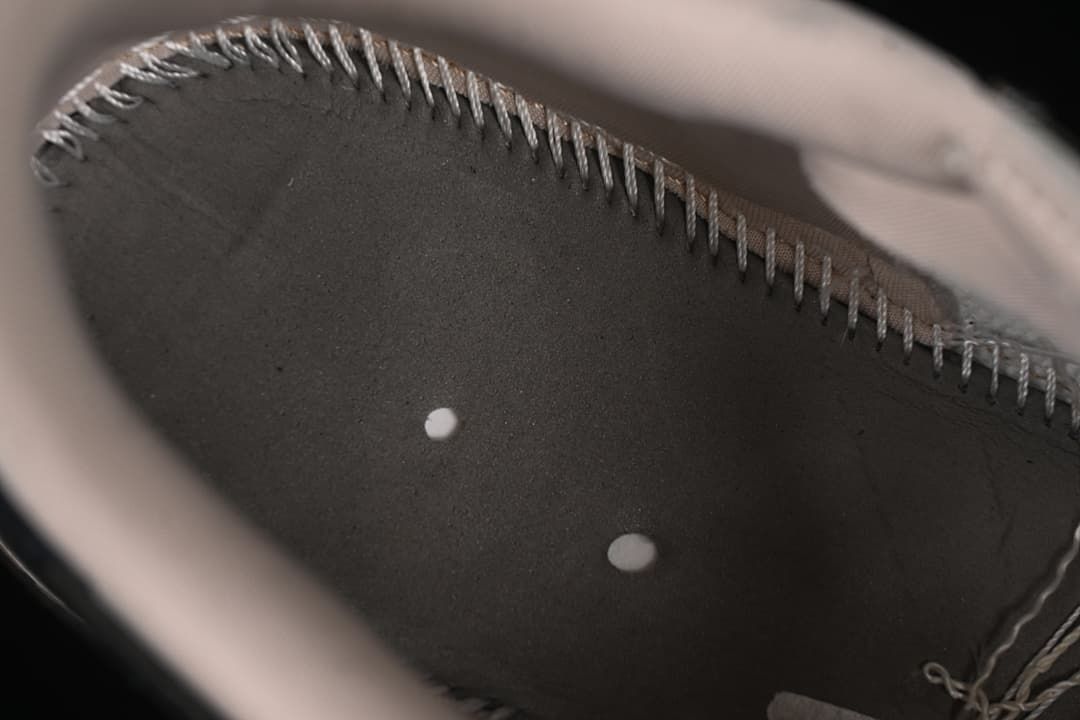 Interior stitching detail inside the sneaker