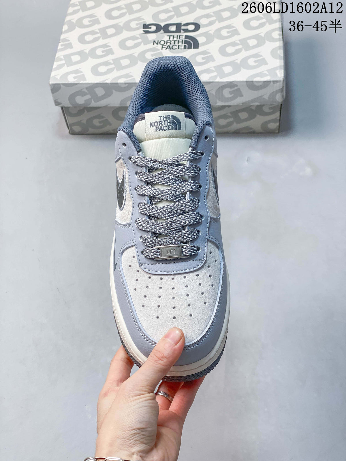 Top view showing the perforated toe, patterned laces, and tongue label.