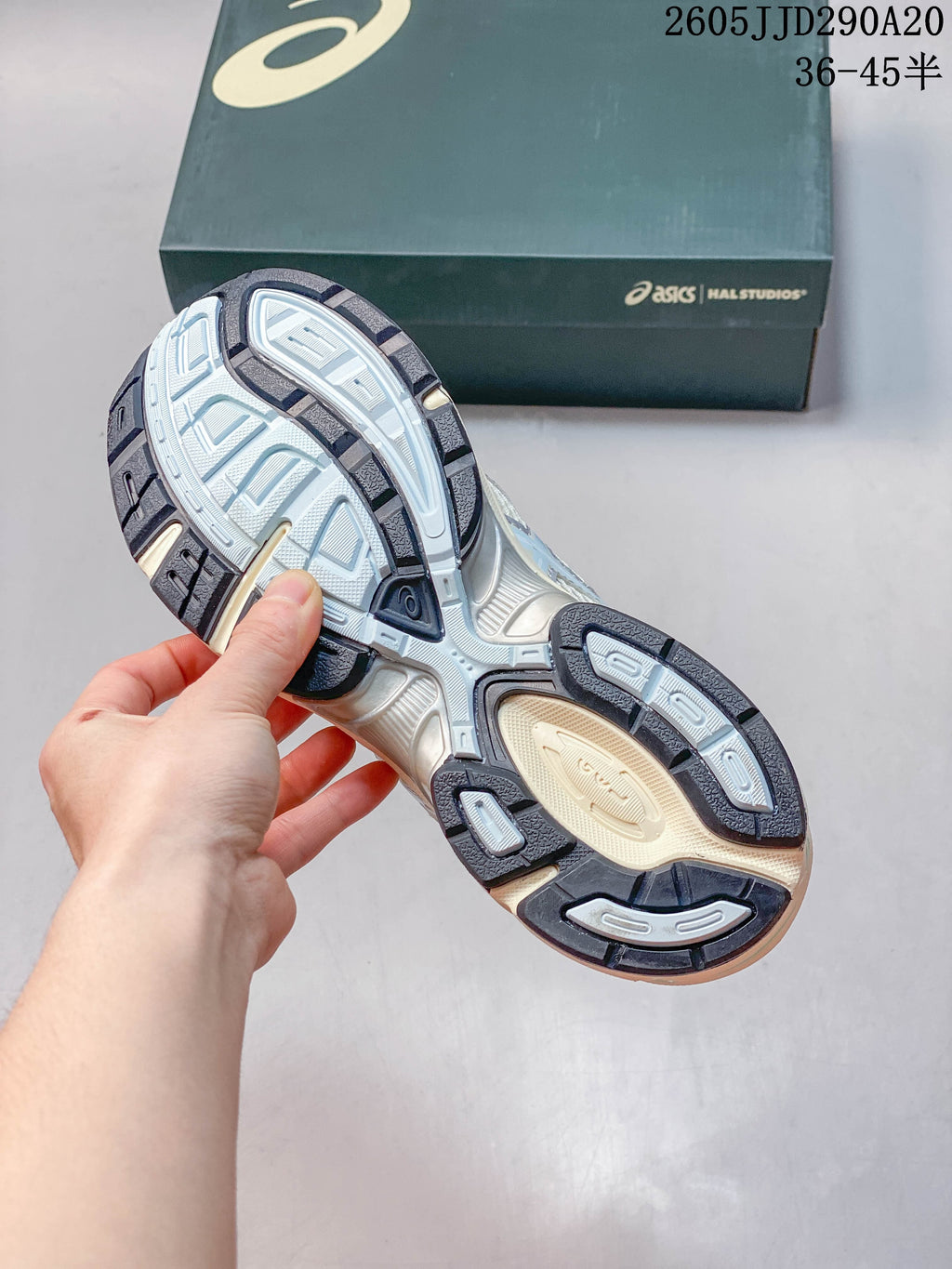 Underside of an ASICS GEL-1130 sneaker showing the patterned outsole