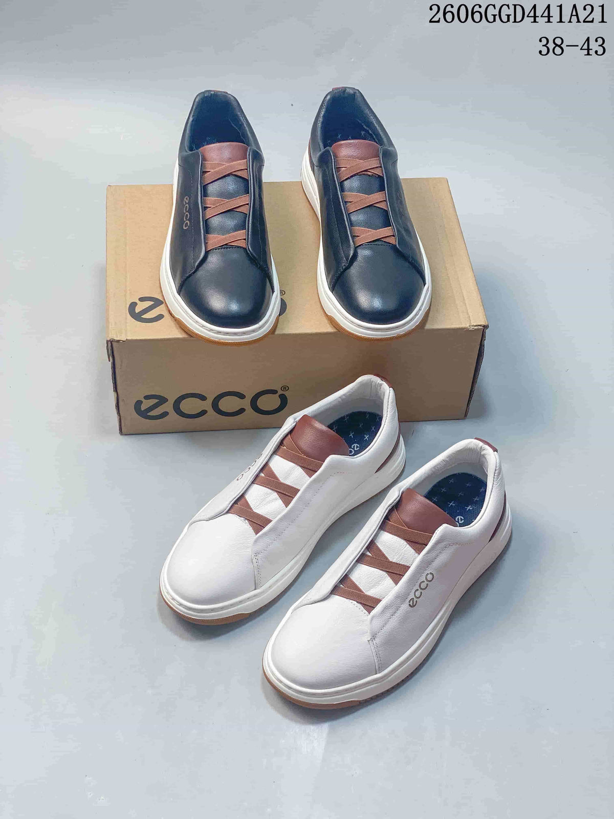 Navy and white ECCO slip-on sneakers with brown accents, shown together.
