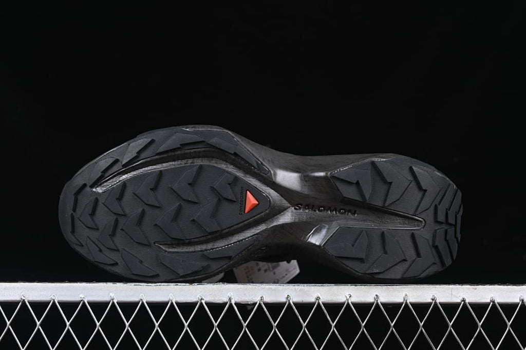 Underside view showing the patterned black outsole.