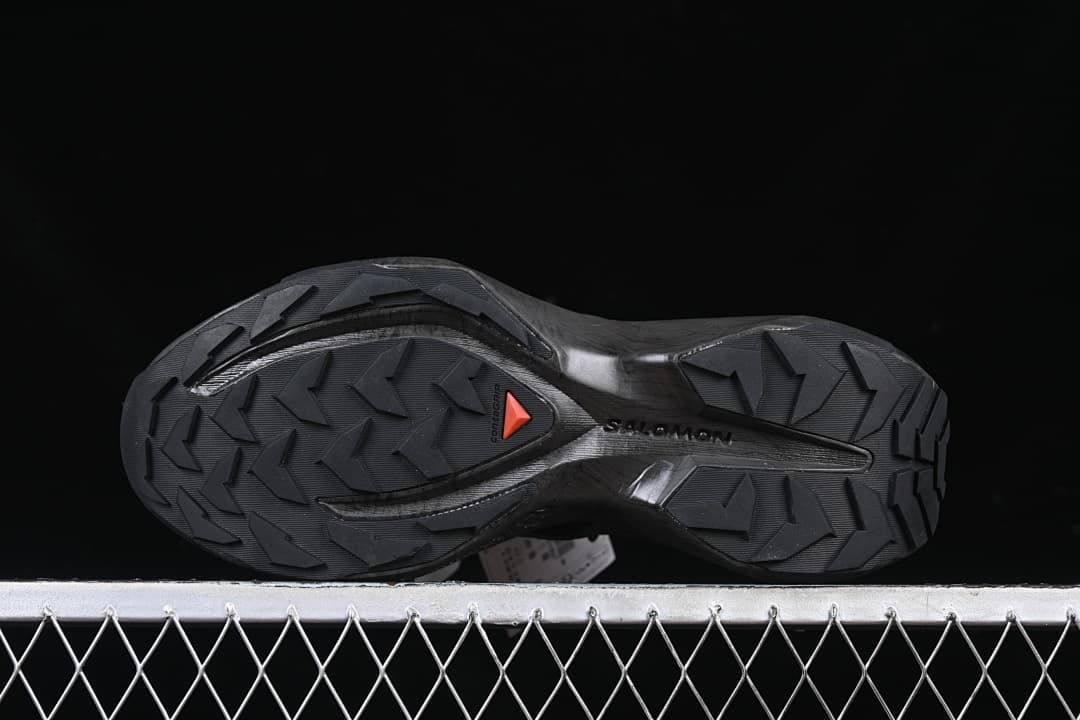 Underside view showing the patterned black outsole.