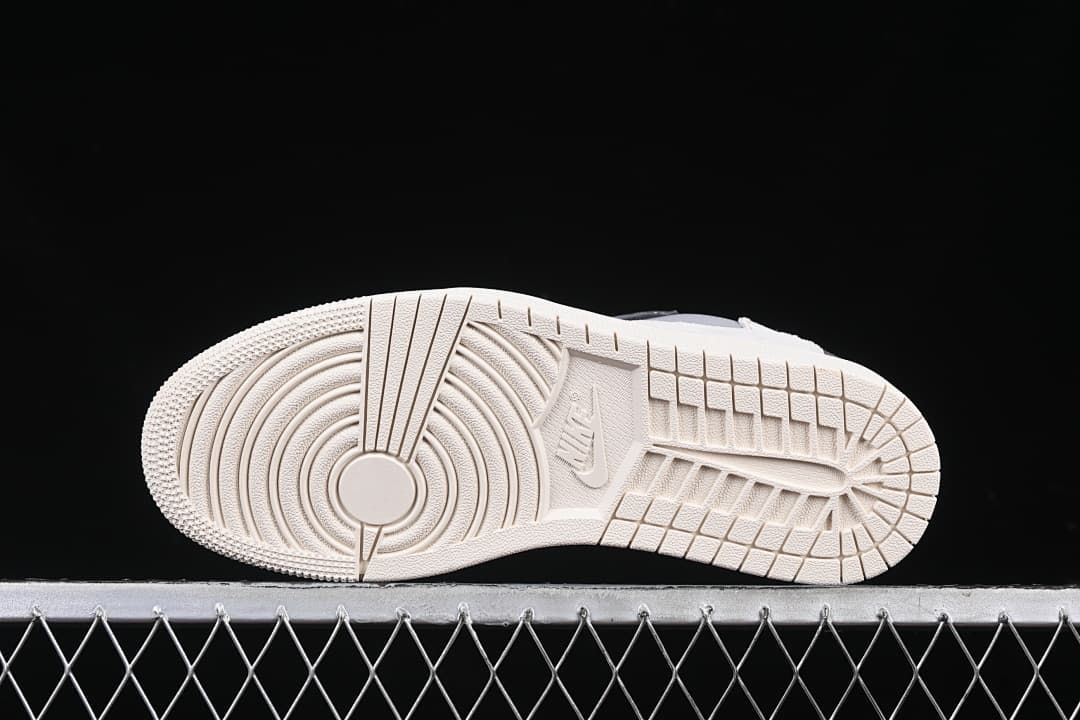 Underside view showing the light-colored rubber outsole tread