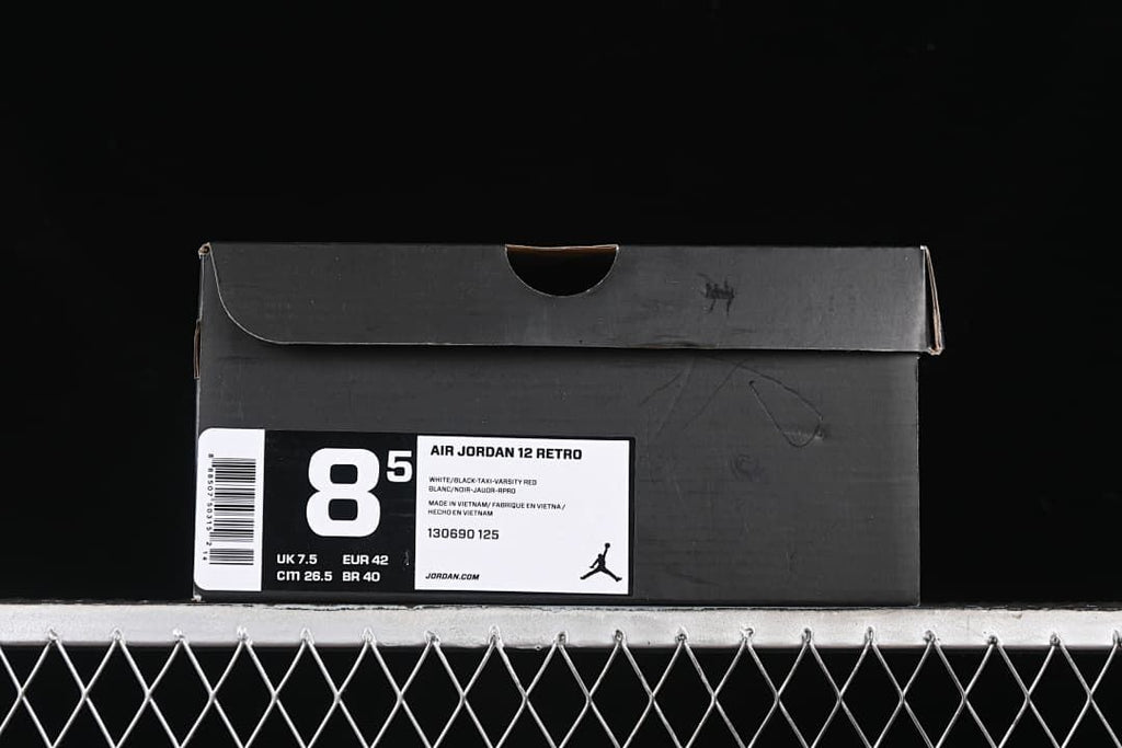 Shoe box label identifying Air Jordan 12 Retro in White/Black-Taxi-Varsity Red, size US 8.5 and EUR 42.