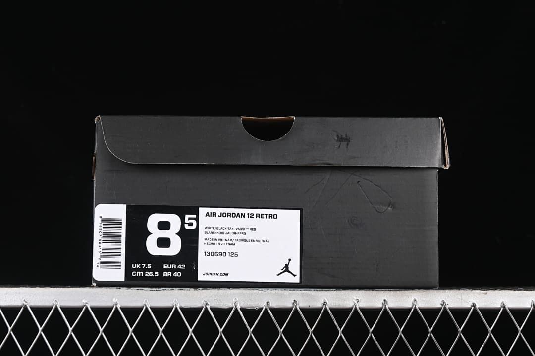Shoe box label identifying Air Jordan 12 Retro in White/Black-Taxi-Varsity Red, size US 8.5 and EUR 42.