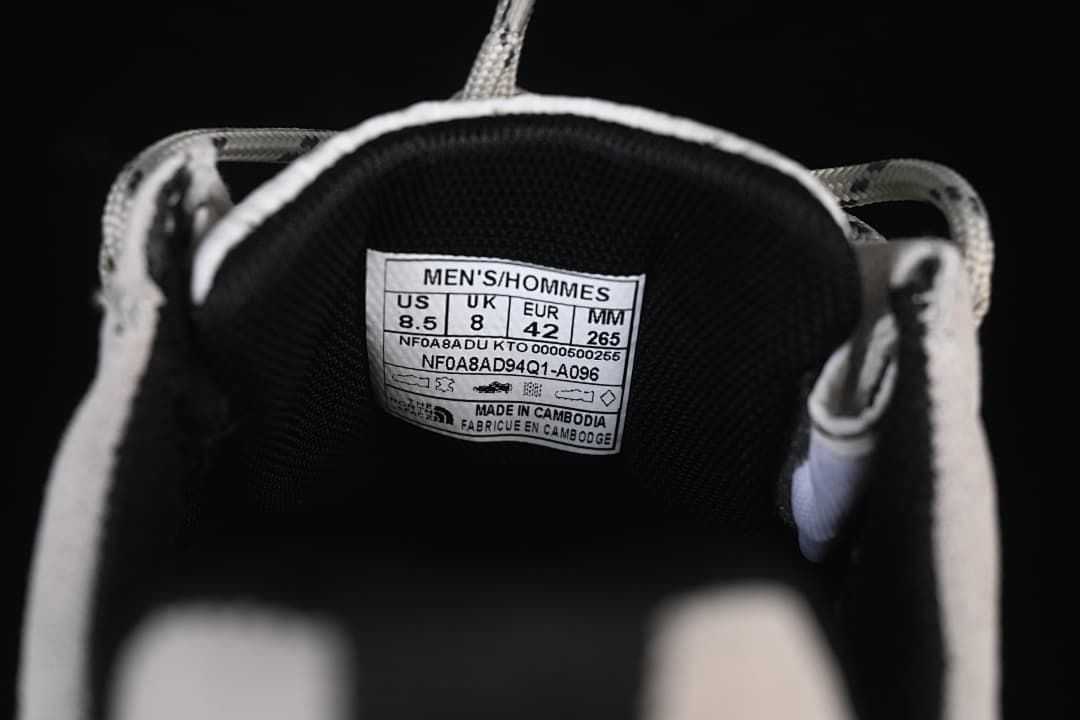 Men's shoe size label showing US 8.5, UK 8, EU 42 and 265 mm