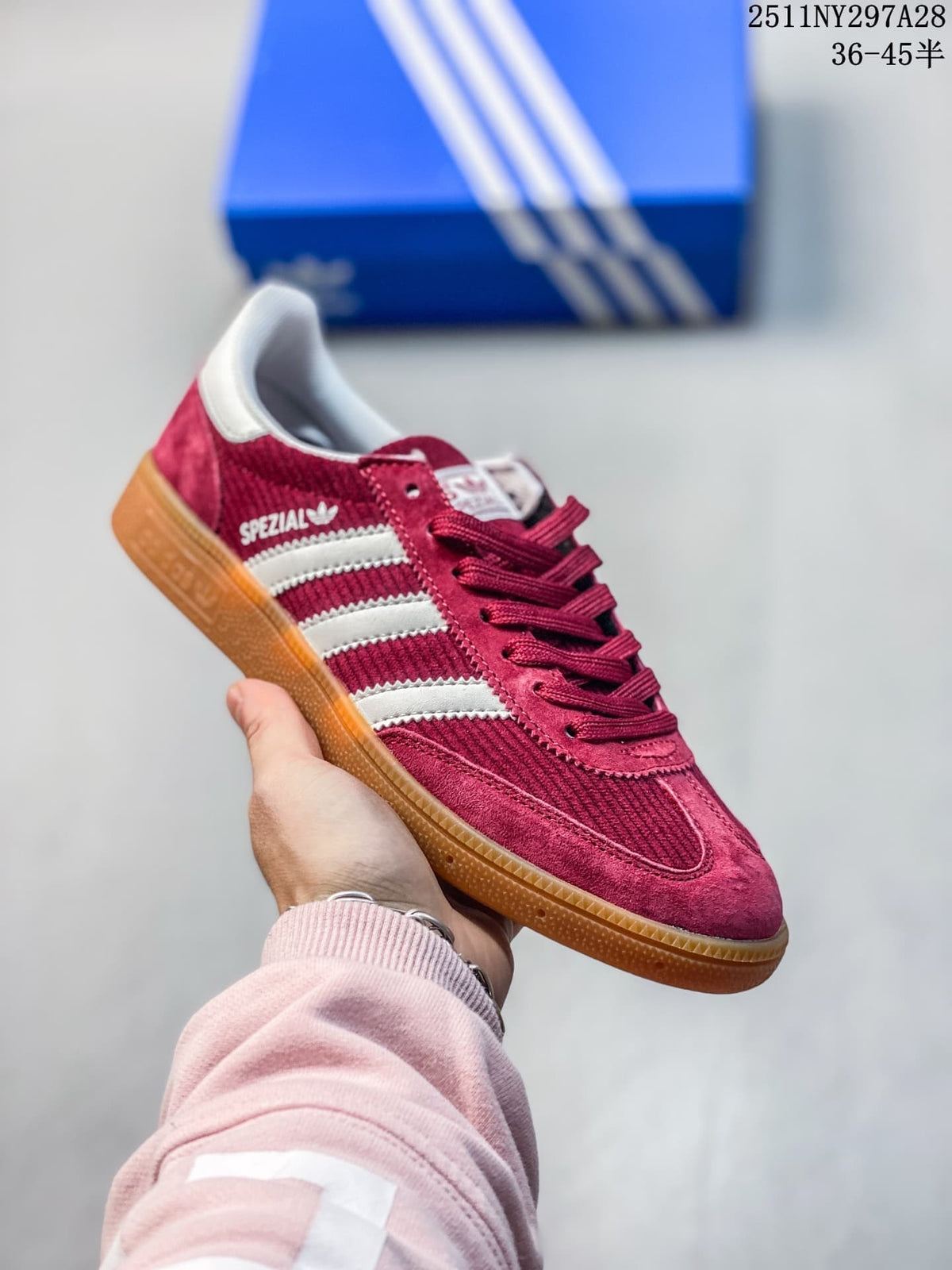 Burgundy adidas Handball Spezial sneaker with white stripes and a gum outsole