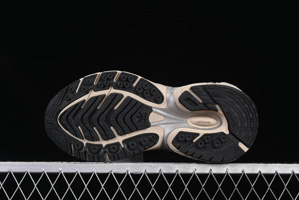 Underside view of the black tread outsole