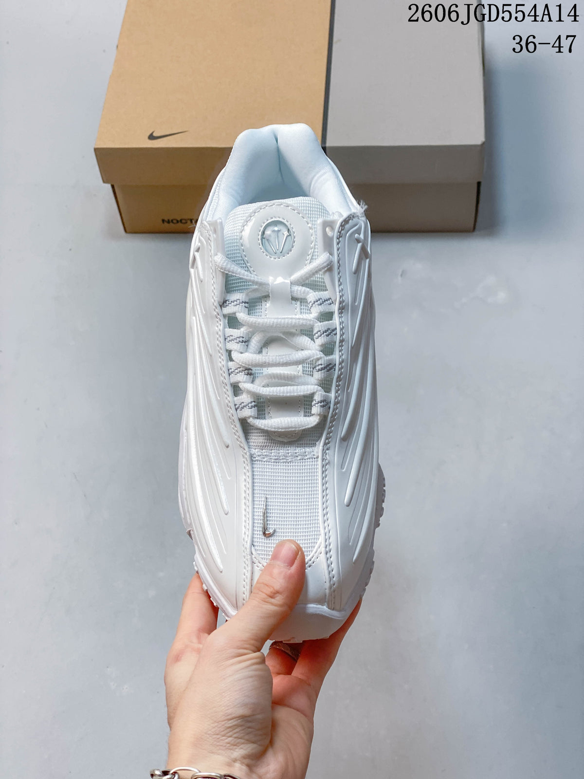 Top view of the sneaker with laces and tongue detail