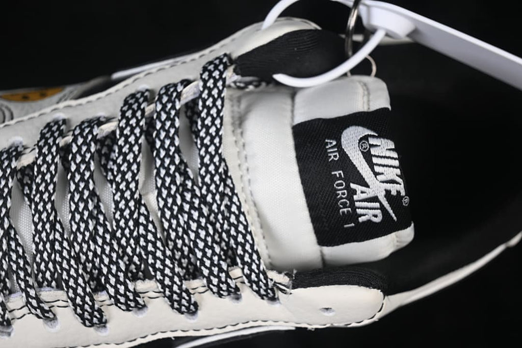 Close-up of the tongue label and black-and-white laces