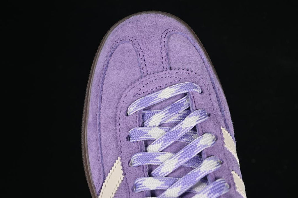 Top-front close-up of the suede-like toe and laces