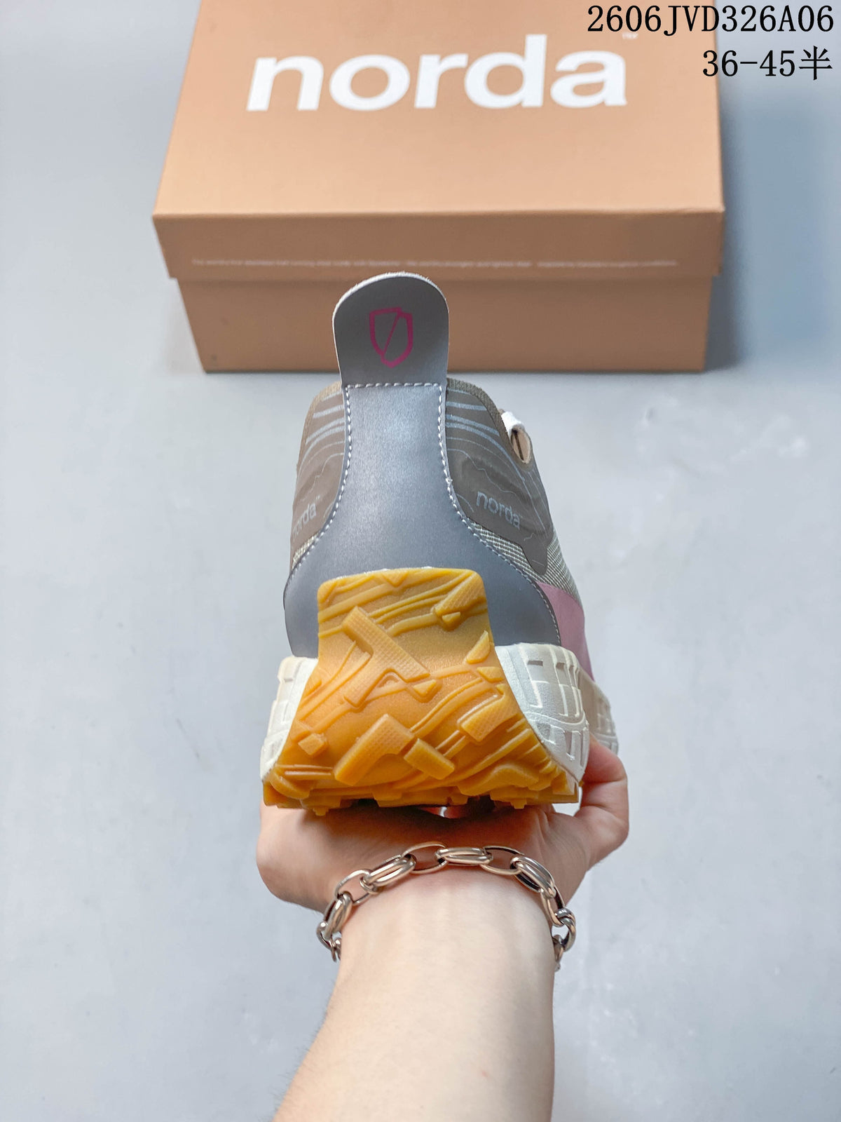 Rear view showing the heel pull tab and lugged outsole.