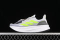 Side view of gray and white Adidas Ultraboost 5X shoes with bright lime accents.