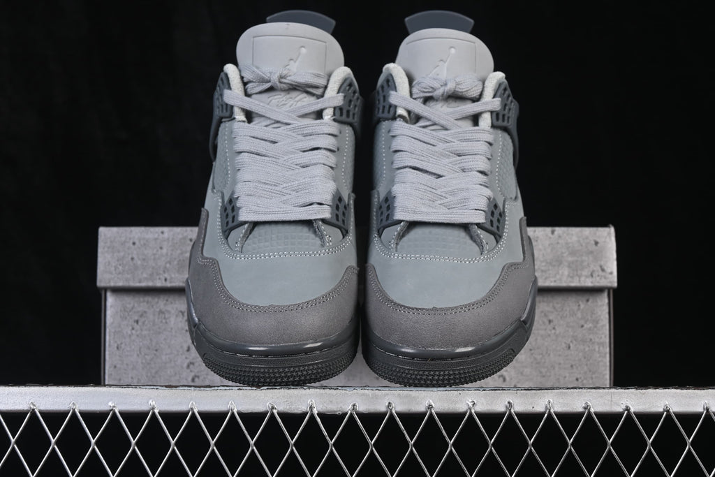Front view of the grey Air Jordan 4 Retro SE pair.