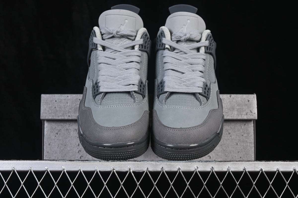 Front view of the grey Air Jordan 4 Retro SE pair.