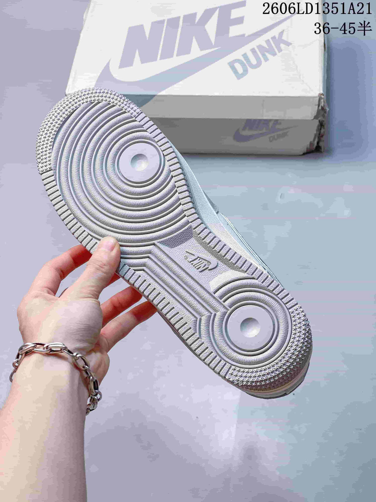 Close-up of the circular tread pattern on the sneaker outsole