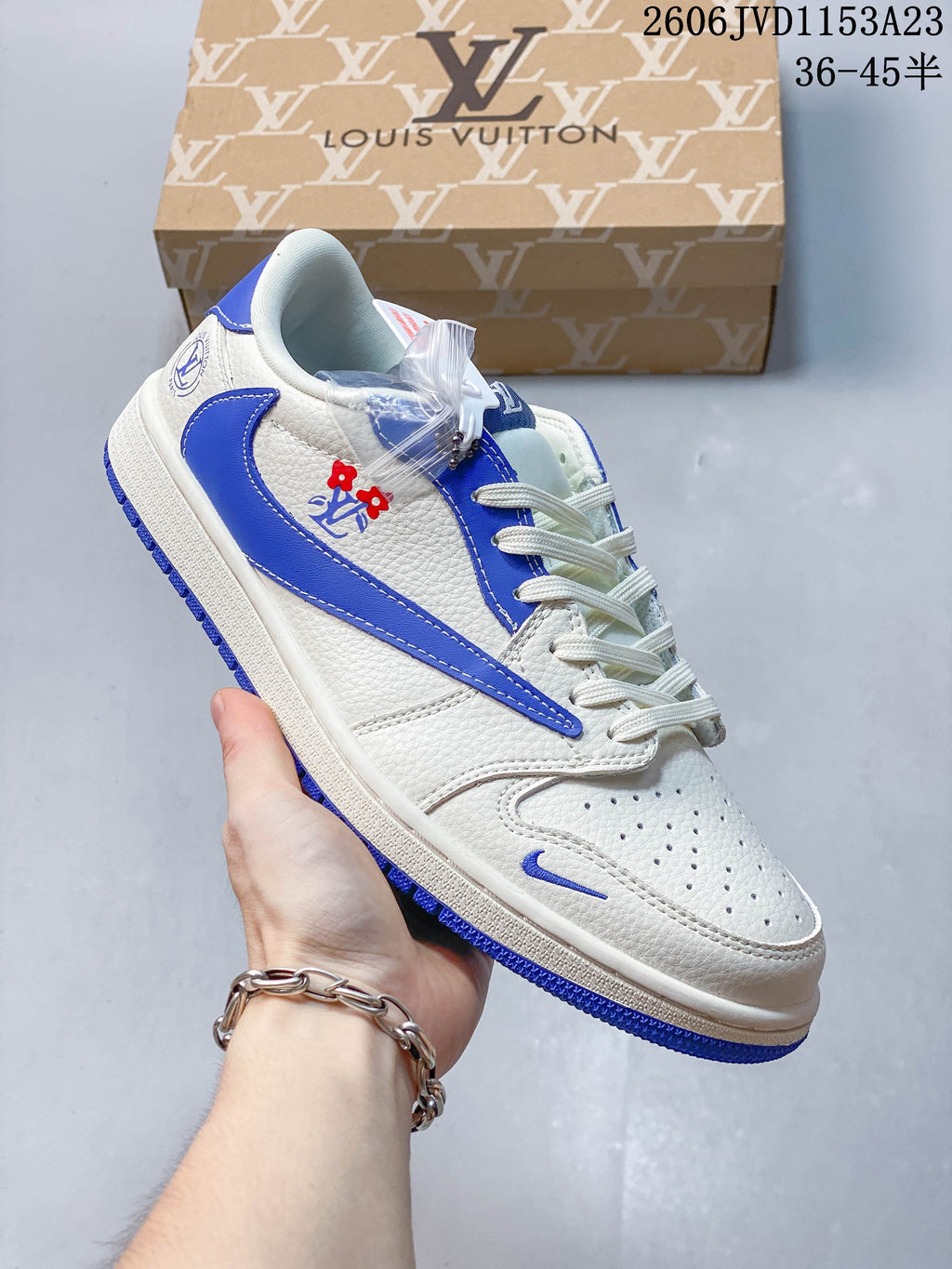 Side view of the off-white and blue sneaker with decorative side details