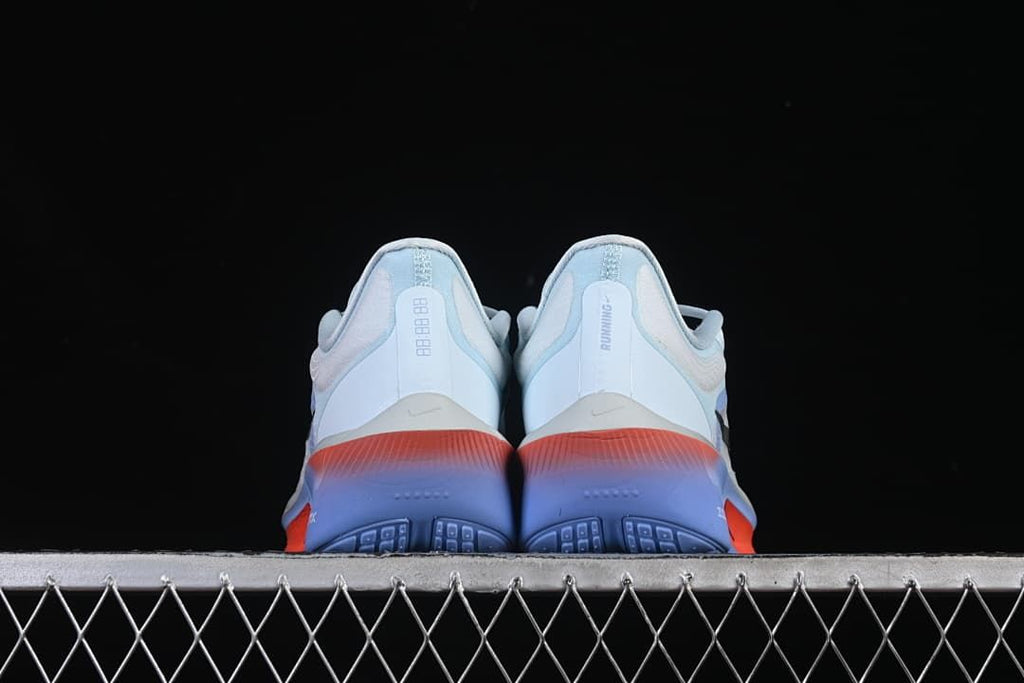 Rear view of both shoes showing heel details and colorful soles.