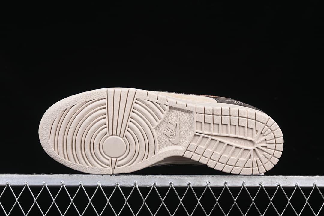 Underside view showing the patterned off-white outsoles.