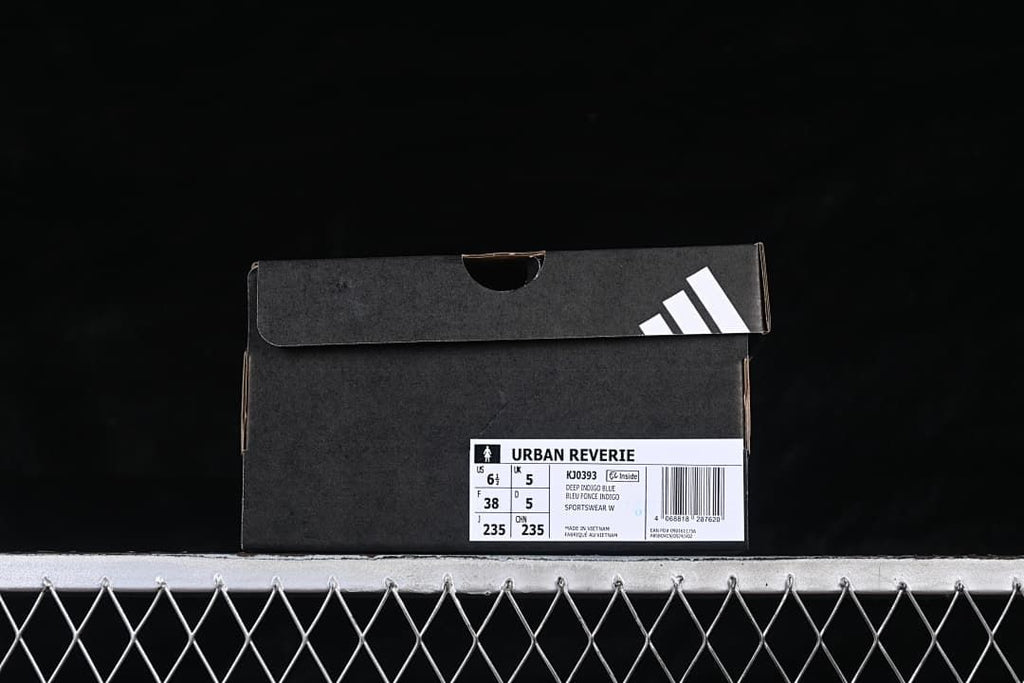 Shoe box label identifying the Urban Reverie KJ0393 in Deep Indigo Blue; photographed box size EU 38.