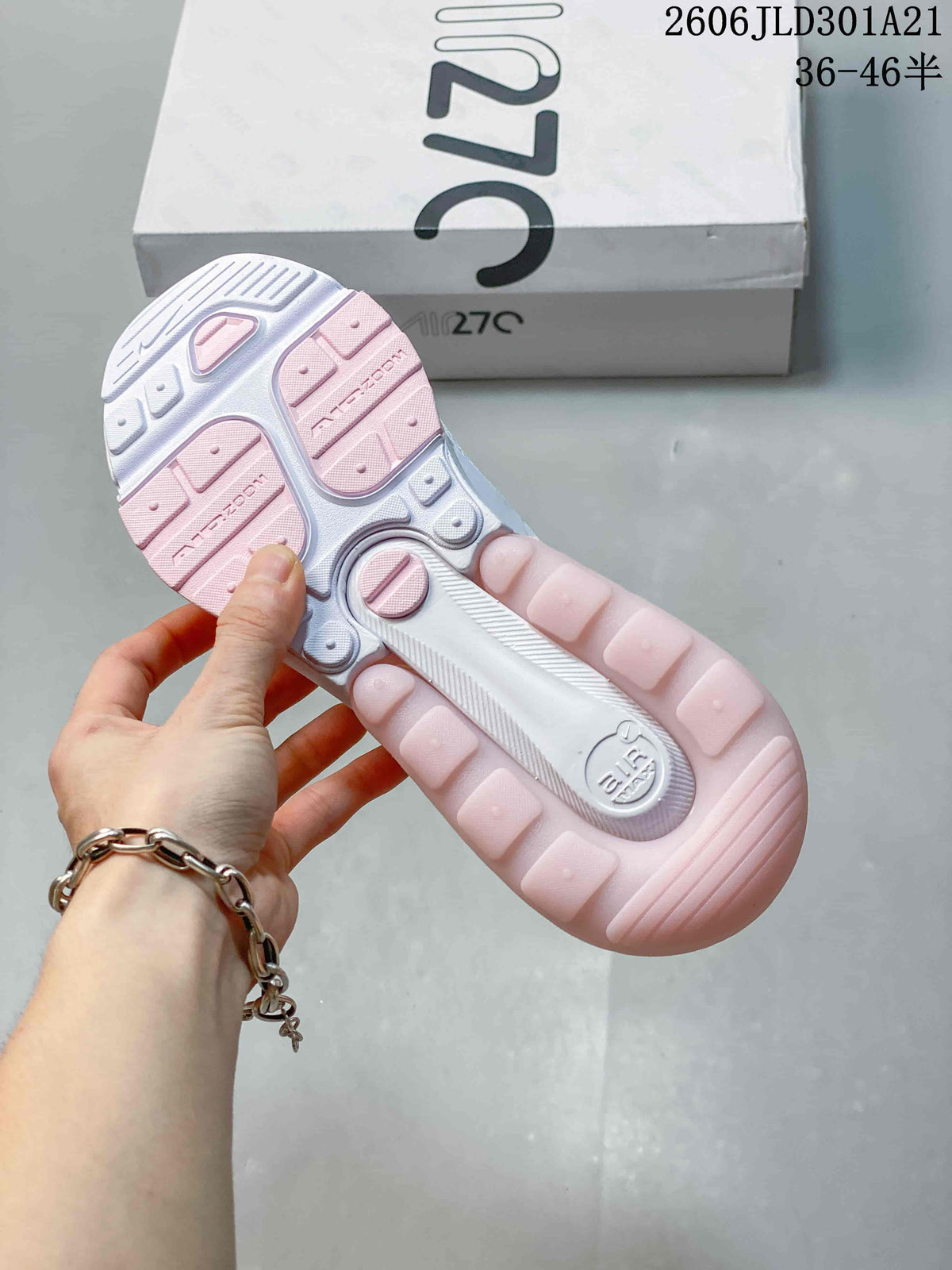 Outsole view of a Nike Air Max 270 Premium sneaker with pink and white sections